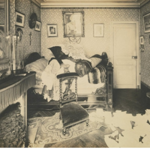 A Victorian bedroom in a state of disarray