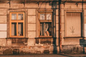 old woman at window