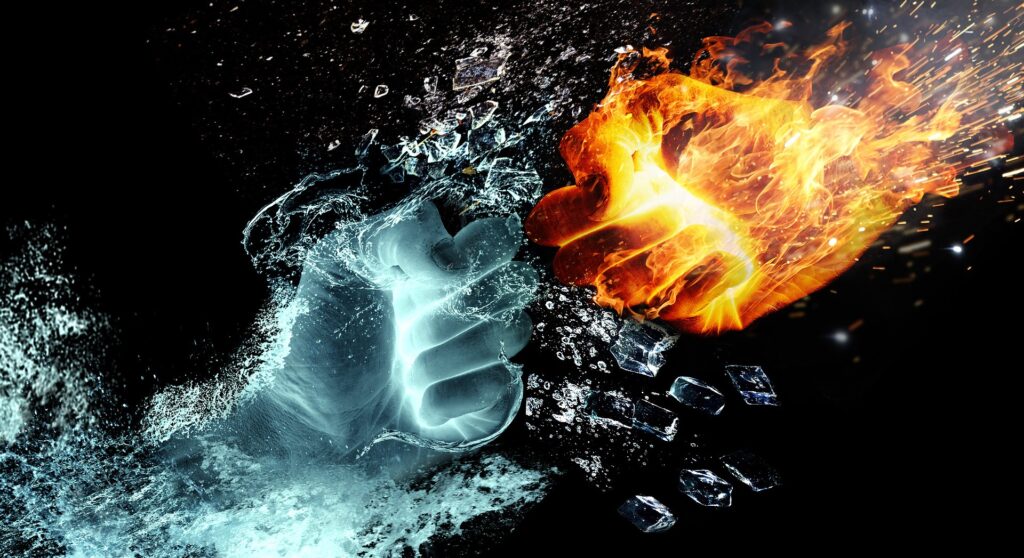 a frozen hand meeting a fiery hand