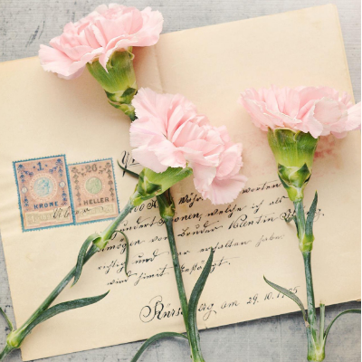 letter with carnations