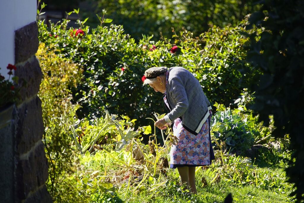 old woman in garden