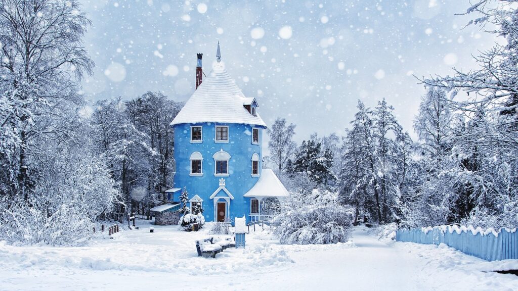 Blue house in a snowy setting