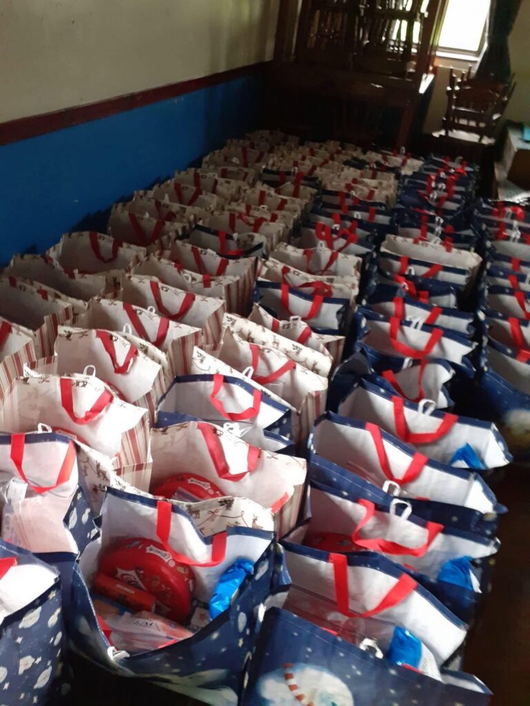 Bags by Packed with Love with items to help children in emergency care. Plus poster of the event